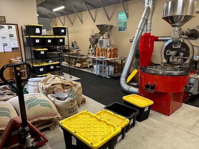 Freshly roasted coffee beans cooling after a roast